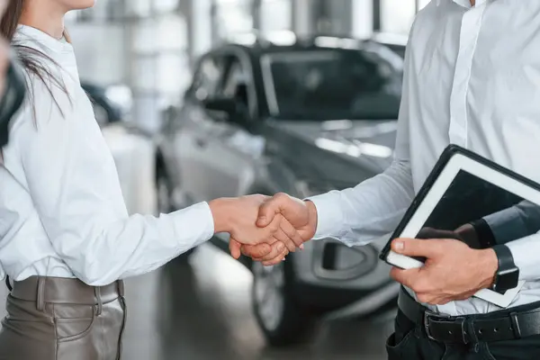 depositphotos_724140580-stock-photo-doing-handshake-close-view-man